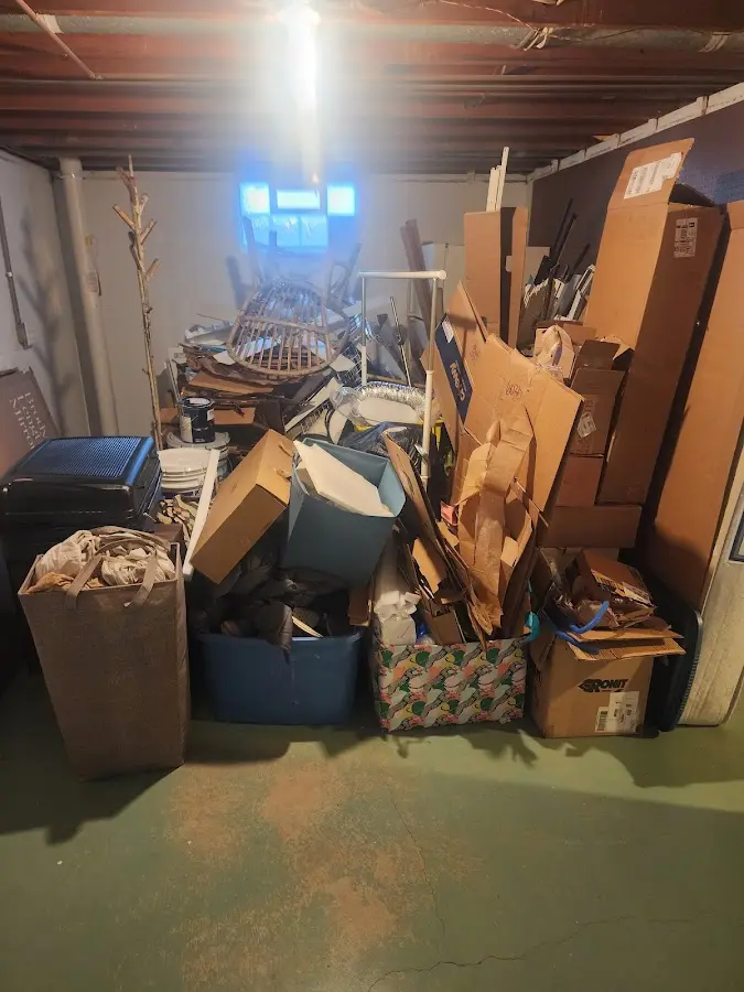 Roll-off dumpster container at job site for Construction Dumpster Rental in Lower Grand Lagoon